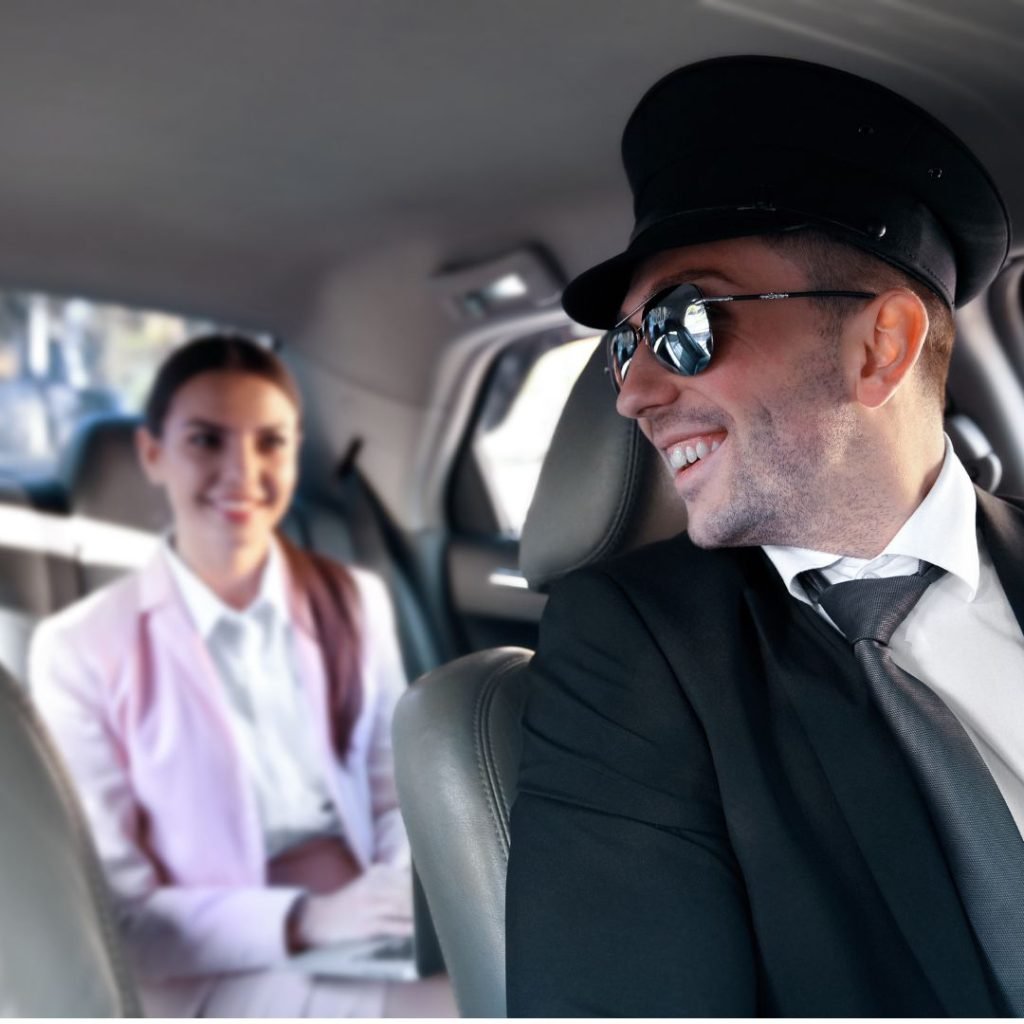 chauffeur talking to passenger