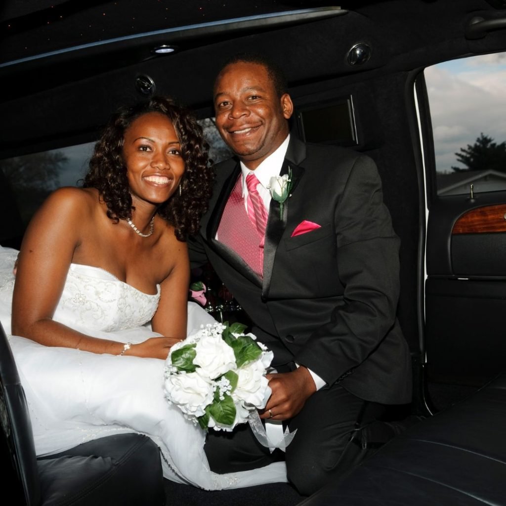 wedding couple in a limo