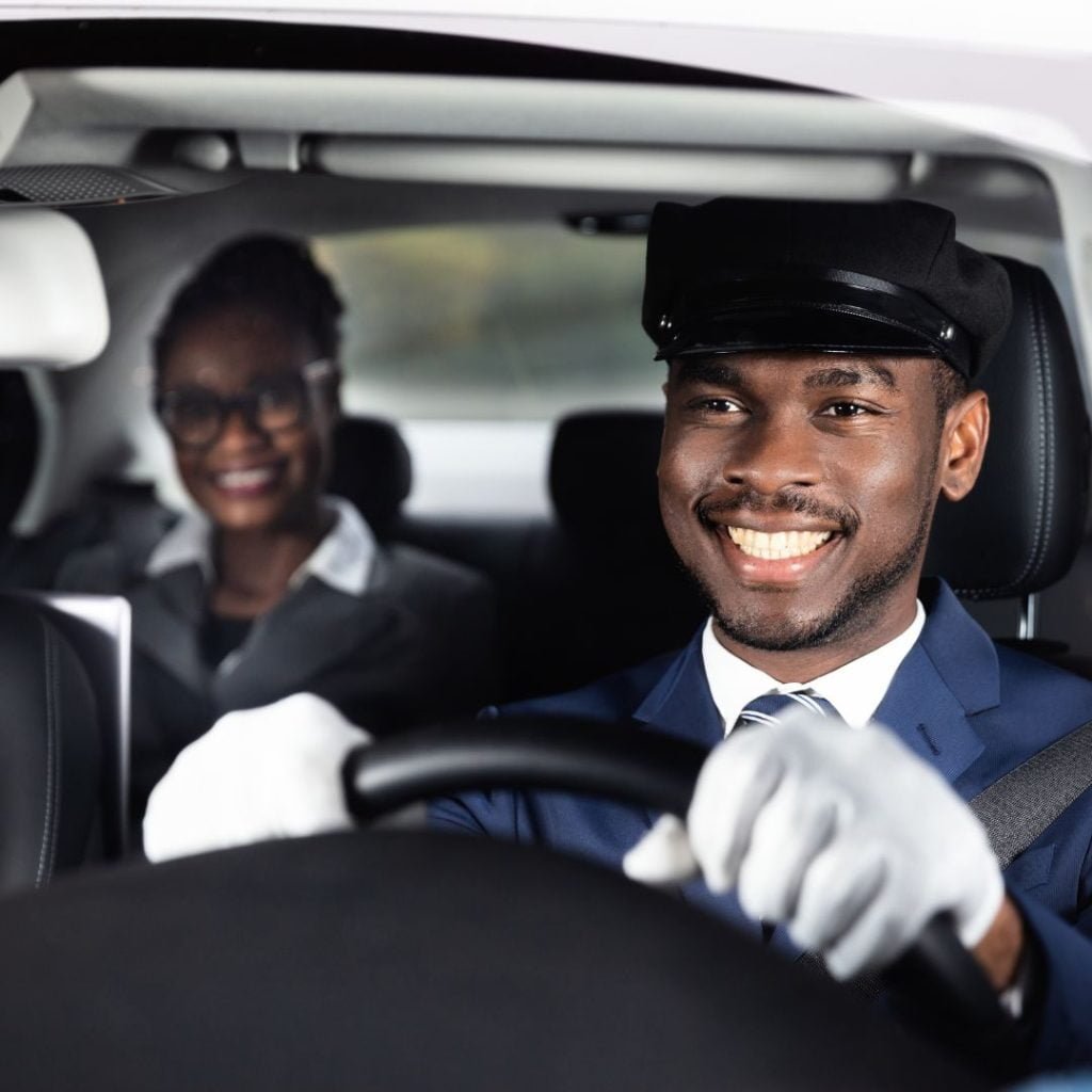 smiling limo driving
