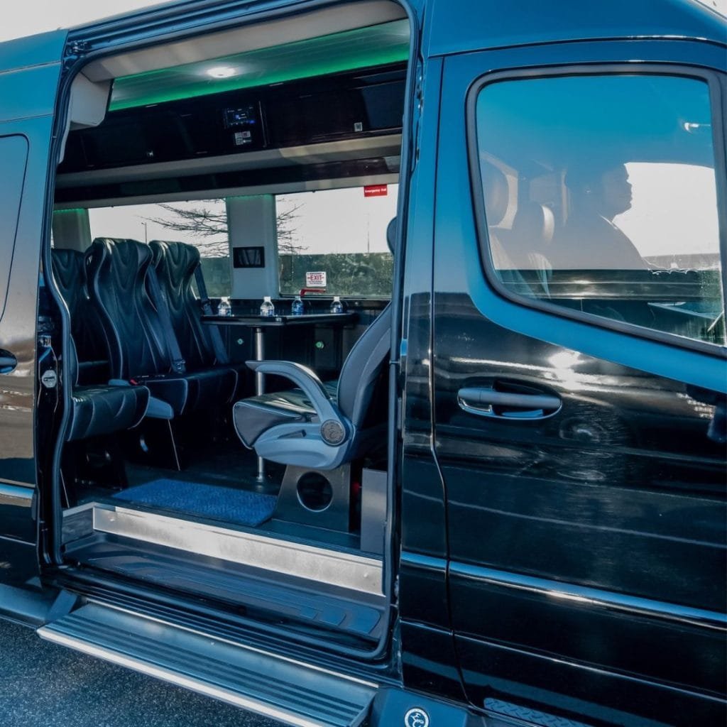 open door on a mini coach bus