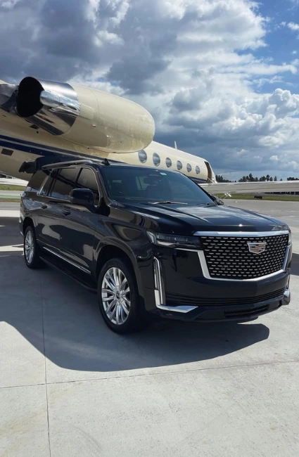 A black luxury SUV at airport
